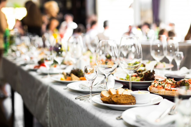 What does a Wedding catering Package Include for Different Serving Style?